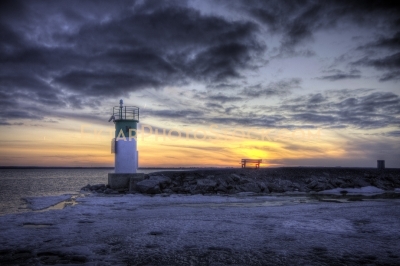 Aylmer Marina Sunset With Lighthouse and ice on the river