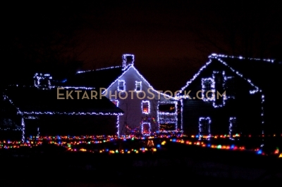 Houses decorated with colorful Christmas lights