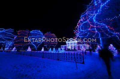 Mansion Front yard decorated with colorful Christmas lights