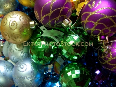 Multiple Christmas balls green purple sparkly