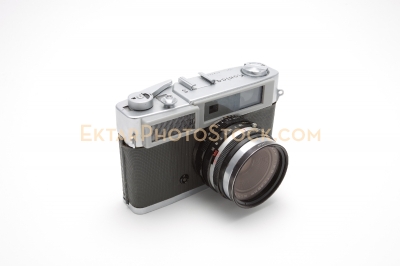 Old film rangefinder camera isolated on white