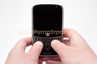 Smartphone isolated on white with hands typing message