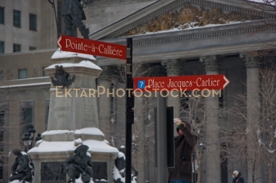 Two street signs in Montreal at winter